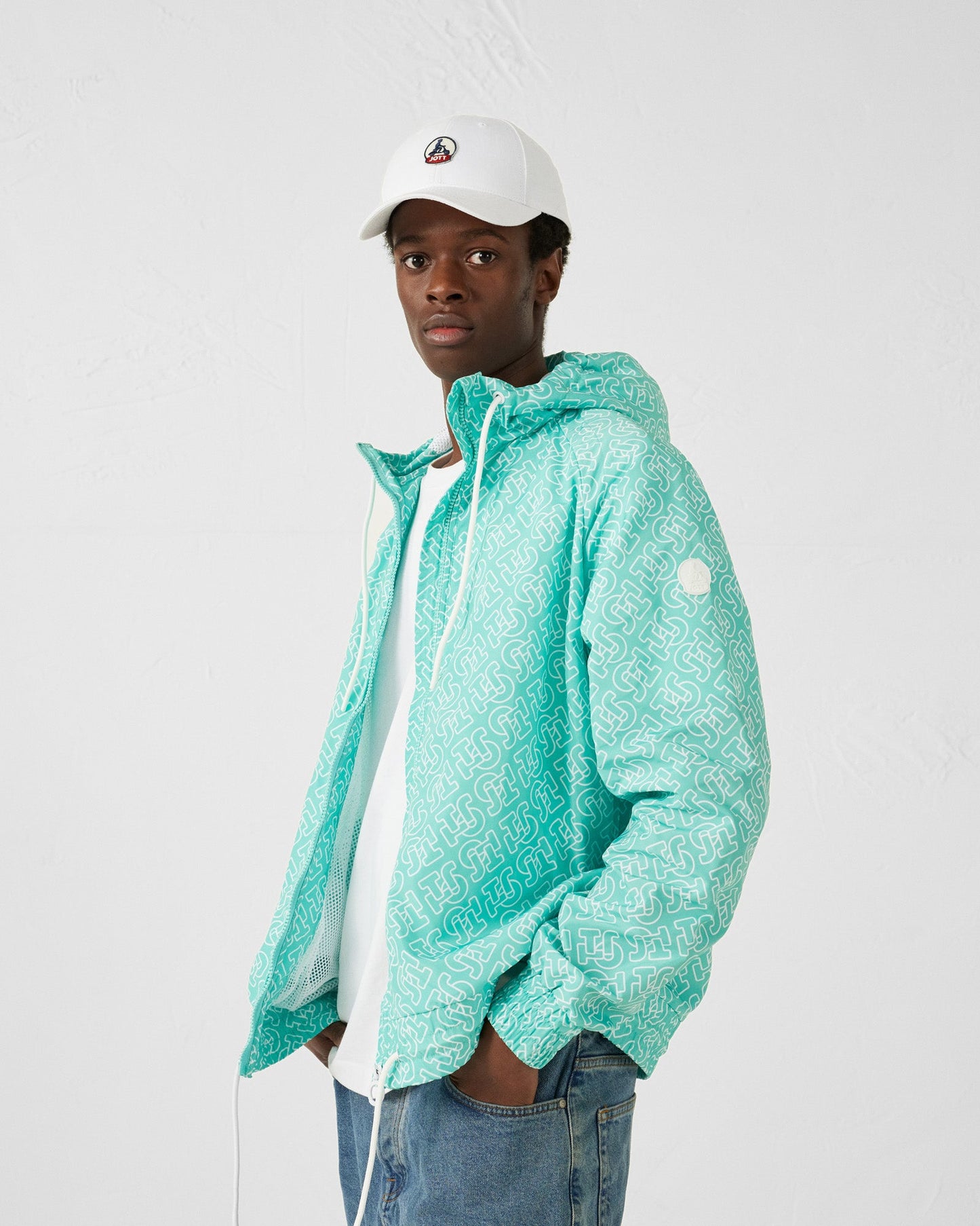 Blouson coupe-vent léger à capuche Mono lagon Storm monogram