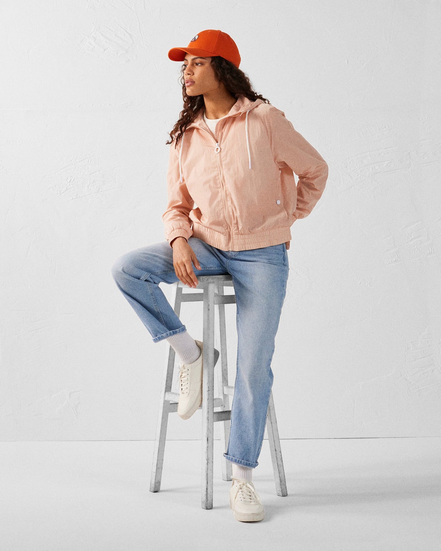 Blouson coupe-vent léger à capuche Pêche clair Alize