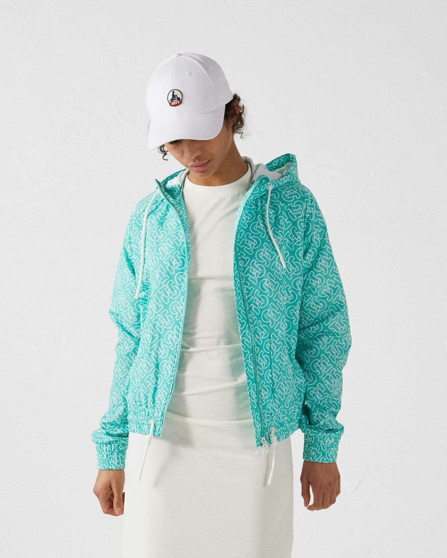 Blouson coupe-vent léger à capuche Mono lagon Alize monogram